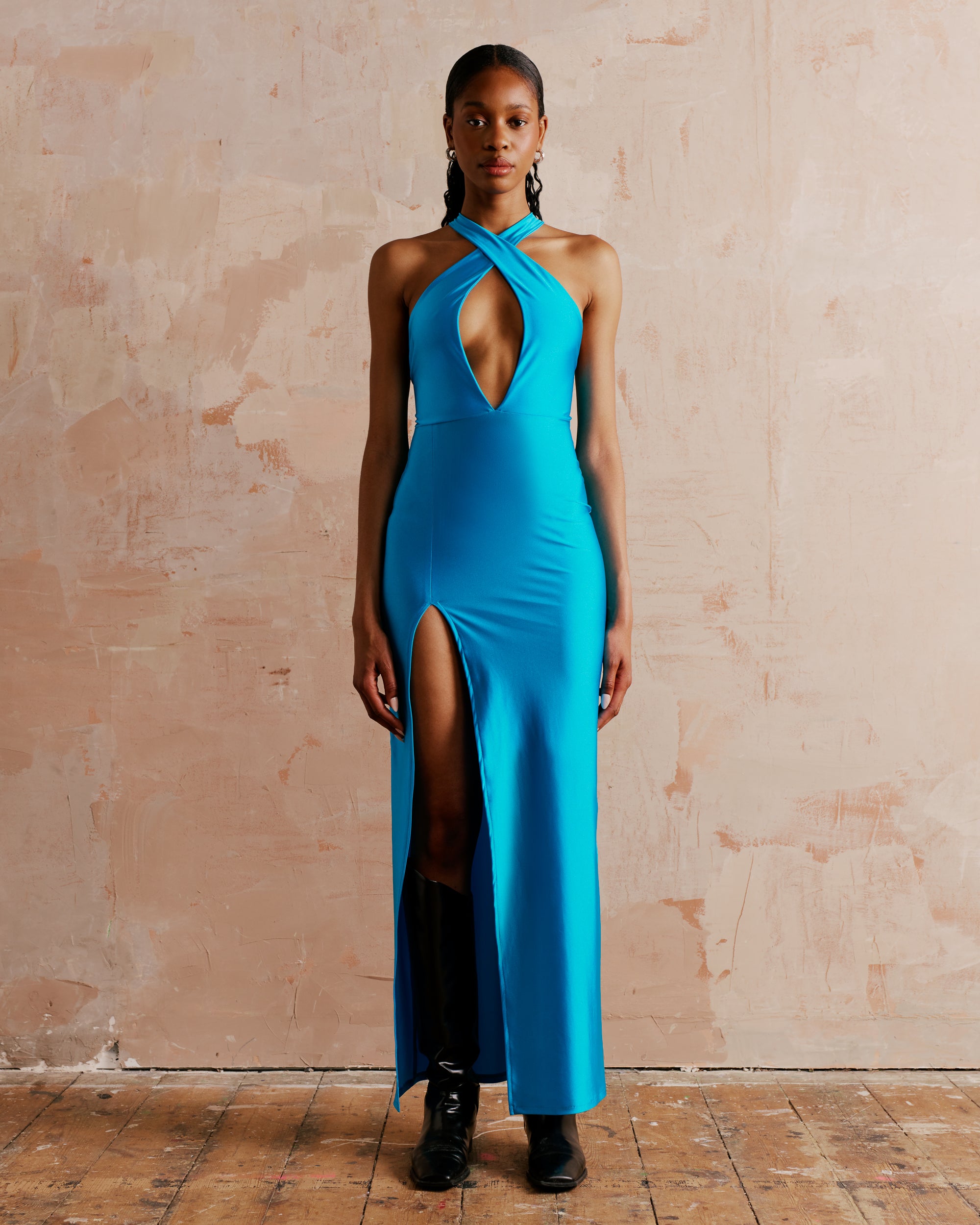Halter neck maxi dress with a high split and open back in turquoise, perfect cocktail dress for a special occasion