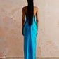 Halter neck maxi dress with a high split and open back in turquoise, perfect cocktail dress for a special occasion