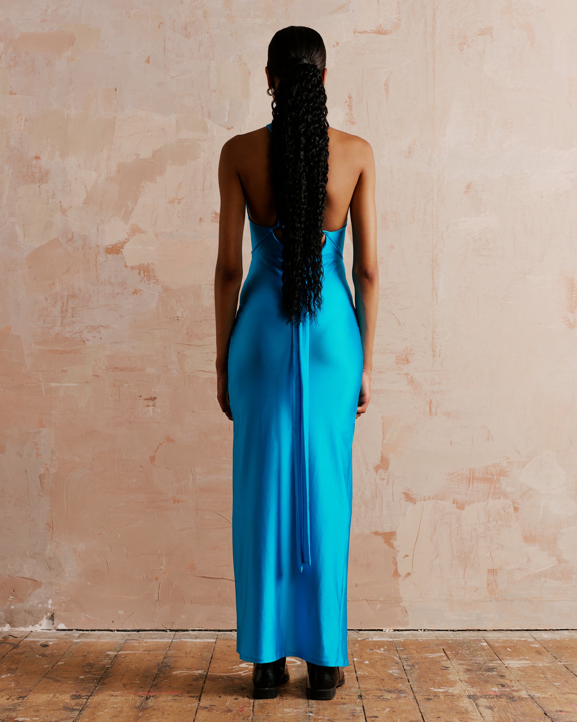 Halter neck maxi dress with a high split and open back in turquoise, perfect cocktail dress for a special occasion