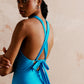 Halter neck maxi dress with a high split and open back in turquoise, perfect cocktail dress for a special occasion